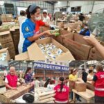 CONTINUOUS REPLENISHMENT. Department of Social Welfare and Development staff and volunteers are busy repacking family food packs (FFPs) at the Visayas Disaster Resource Center (VDRC) in Mandaue City, Cebu province on Oct. 23, 2024. The VDRC and the National Resource Operations Center in Pasay City are continuously engaged in the repacking and hauling of family FFPs to ensure that communities affected by calamities receive immediate relief and support. (Photo courtesy of DSWD)