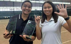 SIX-TIME CHAMPION. Filipinos Tennielle Madis (left) and Stefi Marithe Aludo hold the girls' doubles trophies during the awarding ceremony of the J60 PHINMA-ITF Junior Championships 2 at the Manila Polo Club in Makati City on Sunday (July 27, 2025). They beat top seeds Yesung Choo of Korea and Yu-Ning Tsai of Chinese Taipei in the finals, 6-1, 6-4. (Contributed photo)