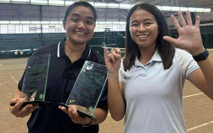 SIX-TIME CHAMPION. Filipinos Tennielle Madis (left) and Stefi Marithe Aludo hold the girls' doubles trophies during the awarding ceremony of the J60 PHINMA-ITF Junior Championships 2 at the Manila Polo Club in Makati City on Sunday (July 27, 2025). They beat top seeds Yesung Choo of Korea and Yu-Ning Tsai of Chinese Taipei in the finals, 6-1, 6-4. (Contributed photo)