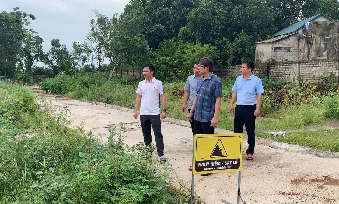 Warning signs are placed in landslide-prone areas.