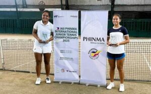 CHAMPIONS. Filipinos Tennielle Madis (left) and Stefi Marithe Aludo hold the girls' doubles trophies during the awarding ceremony of the J60 PHINMA-ITF Week 1 at the Manila Polo Club in Makati City on Sunday (July 20, 2025). The third-seeded Filipino duo stunned No. 2 Taiwanese pair Yuhan Chen and Yu-Ning Tsai, 6-2, 7-5, in the finals. (Contributed photo)