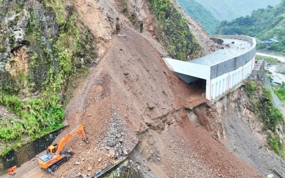NEARING COLLAPSE. The rockshed at Sitio Camp 6 in Barangay Camp 4 along Kennon Road, opened in the first quarter of 2025 to shield the road from frequent landslides, is now at risk of collapsing. Local government officials on Monday (July 28, 2025) pushed for a comprehensive plan to rehabilitate Kennon Road. (PNA photo courtesy of Tuba MDRRMO)