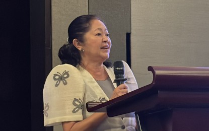 GUEST OF HONOR. First Lady Liza Araneta-Marcos delivers her remarks at the Manila Overseas Press Club’s Grand Tourism Night at New World Makati Hotel on Friday. (Aug. 15, 2025). The First Lady recognized the contribution of tourism in boosting the Philippine economy and also the role of the private sector in its development. (PNA photo by Joyce Rocamora)