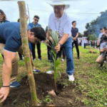 GUINNESS RECORD. San Pablo City Mayor Najie Gapangada (with hat) plants a coconut seedling in a vacant lot on Friday (Aug. 29, 2025). The city broke India’s Guinness World Record for most people planting coconut seedlings simultaneously in different venues, with 11,000 seedlings planted in 15 minutes by thousands of volunteers in 12 villages. (Photo courtesy of San Pablo-CIO)