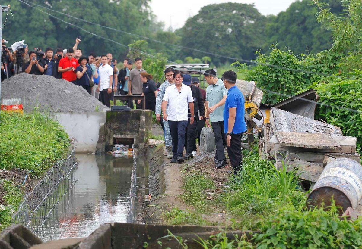 President Ferdinand 'Bongbong' Marcos Jr. inspects the reinforced concrete riverwall project in Barangay Piel, Baliwag, Bulacan on Wednesday, August 20, 2025. Marcos says he is 'very angry' that the P55-million project was recorded as completed, but in reality it was not. PPA