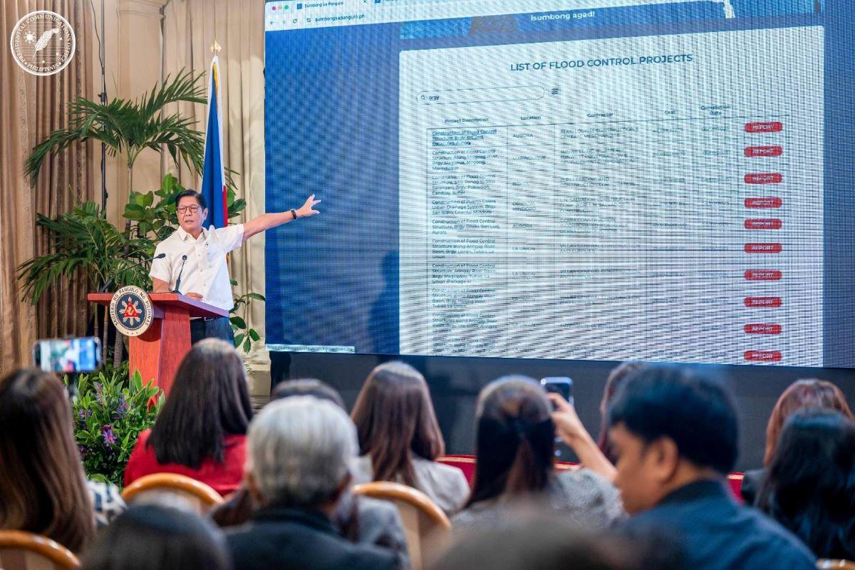 President Ferdinand Marcos Jr. shows a list of flood control projects during a press briefing on Monday, August 11, 2025. PCO