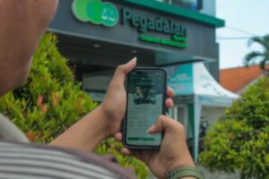 Pegadaian Bangkalan mencatat omzet hampir Rp1 triliun, melalui aplikasi Pegadaian, masyarakat bisa menabung emas, berinvestasi dan mengajukan pinjaman secara mudah sebagai wujud nyata digitalisasi menuju #MengEMASkanIndonesia. Foto iNewsSurabaya/amin