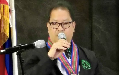 PARTNERSHIP. Emmanuel Clemente, president of the Chamber of Real Estate Builders Association (CREBA)-Baguio and Benguet, delivers his message during the opening program of the national housing convention in Baguio City on Wednesday (Oct. 15, 2025). He said CREBA wants to help bridge the gap in the 139,000 housing backlog in the Cordillera Administrative Region in partnership with local government units. (PNA photo by Liza T. Agoot)