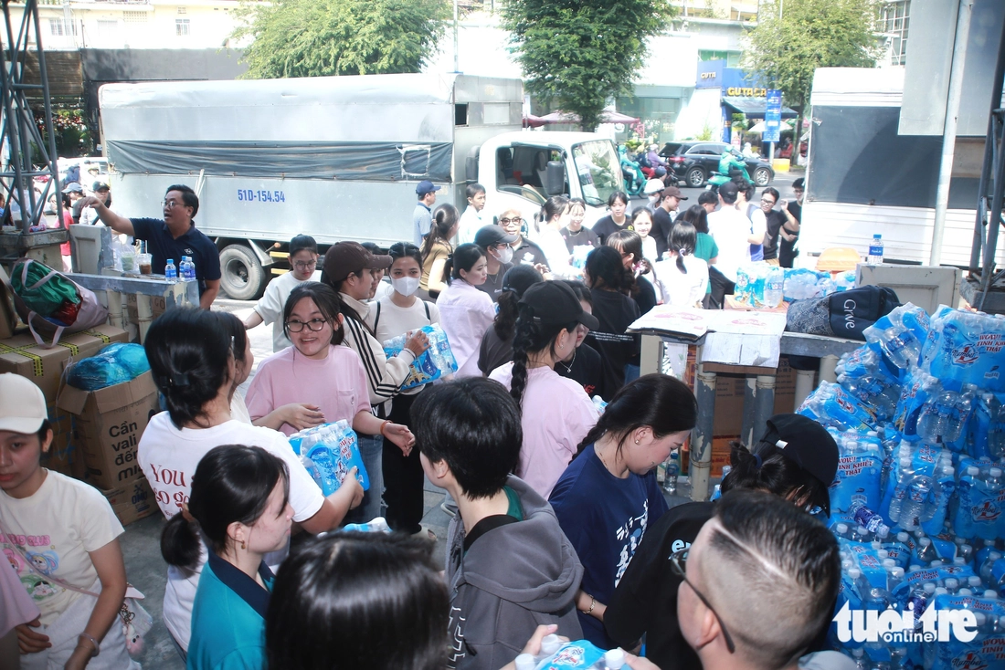 Young people forming assembly line