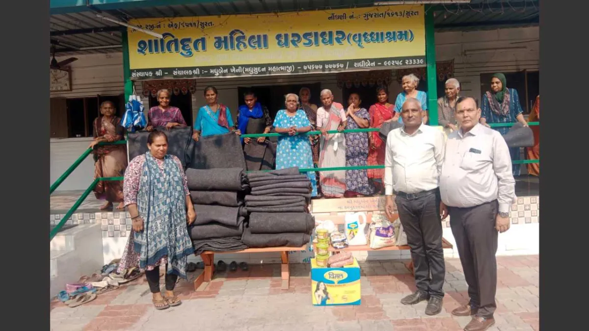 Surat: Service work at an old age home: distribution of blankets and rations to the elderly.