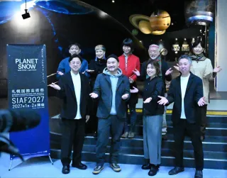 Creative Director Hideaki Ogawa (second from left in front row) and others showing enthusiasm for the next event