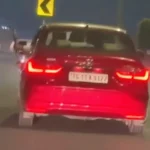 वायरल वीडियो का स्क्रीनशॉट एक्सप्रेसवे पर चलती कार