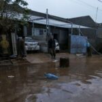 سيول عنيفة اجتاحت مدينة جمجمال بمحافظة السليمانية في إقليم كردستان العراق (رويترز)