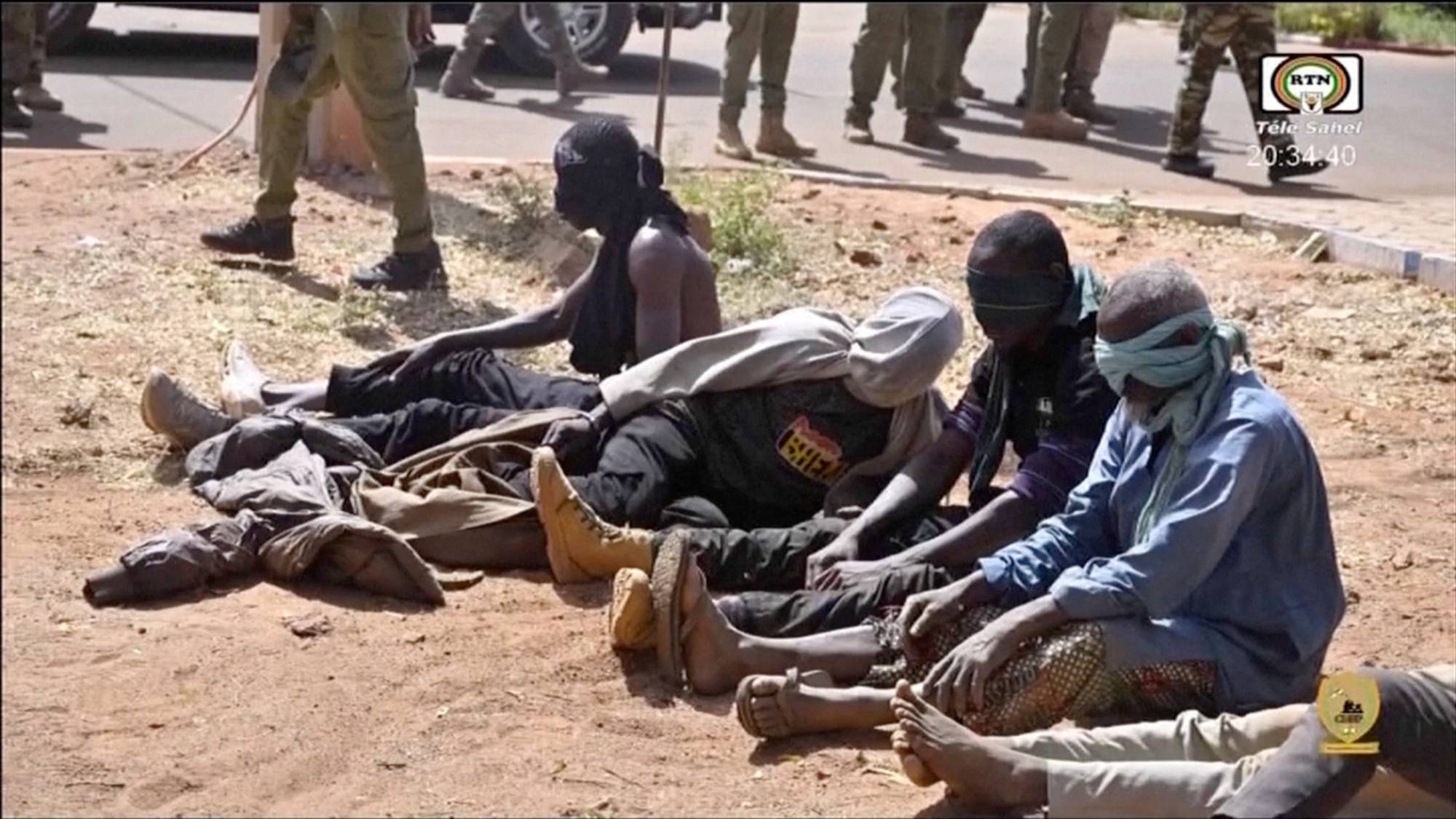 Image from a video released by the Nigerian army of suspects involved in the attack on Niamey airport after their arrest