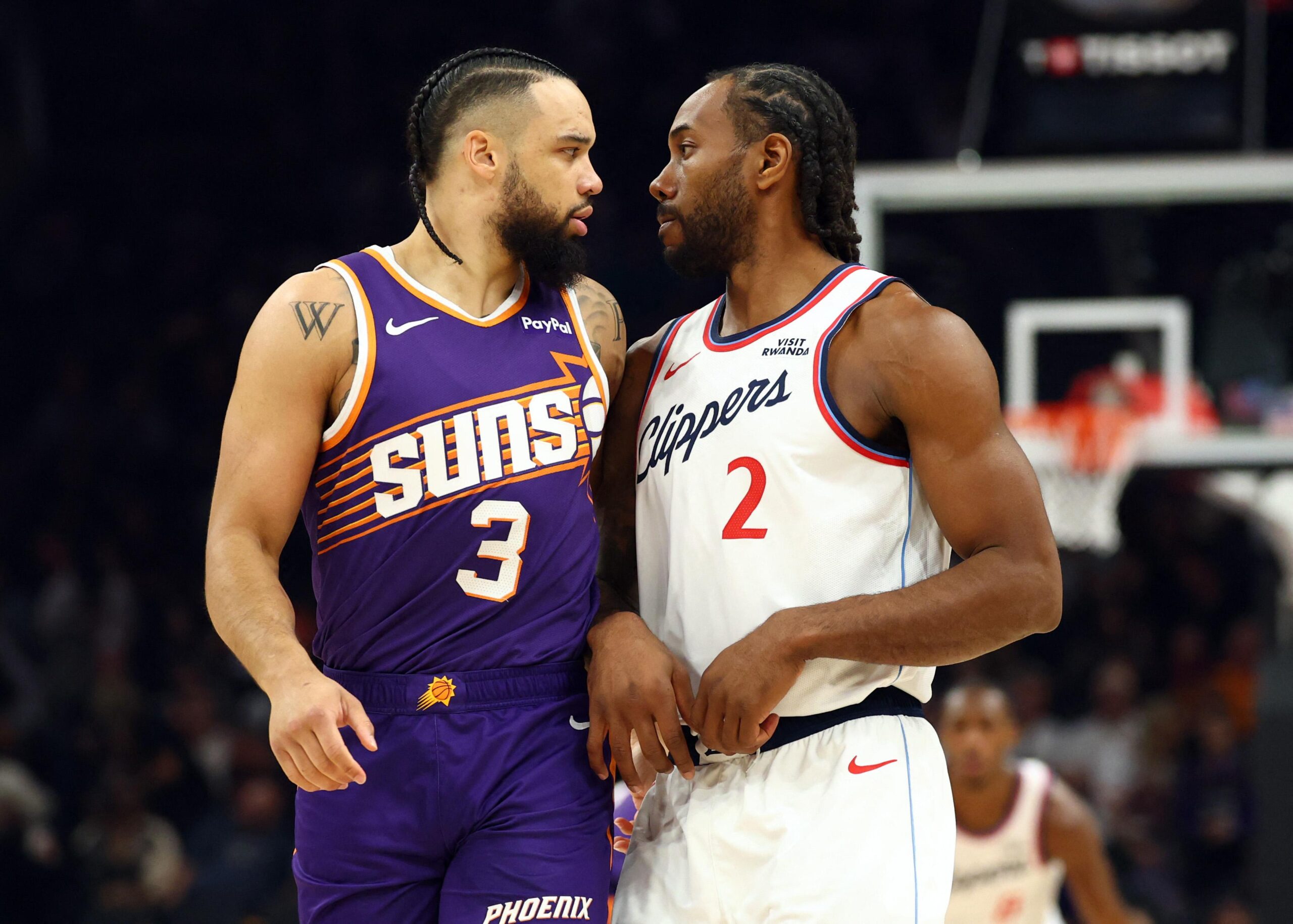 Feb 1, 2026; Phoenix, Arizona, USA; Los Angeles Clippers forward Kawhi Leonard (2) against Phoenix Suns forward Dillon Brooks (3) in the first half at Mortgage Matchup Center. Photo: Mark J. Rebilas-Imagn Images