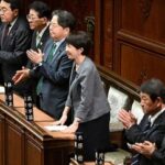Prime Minister Sanae Takaichi, center, bows as a bill to establish a national intelligence committee passes the House of Representatives during a plenary session on April 23, 2026. (Mainichi/Akihiro Hirata)