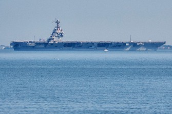 The USS Gerald R. Ford aircraft carrier leaves Naval Station Norfolk, June 23, 2025, in Norfolk, Va. (AP Photo/John Clark, File)