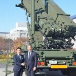 Defense Minister Shinjiro Koizumi, left, and Australian Deputy Prime Minister and Defense Minister Richard Marles inspect Patriot PAC-3 surface-to-air guided missiles at the Defense Ministry in Tokyo's Shinjuku Ward on Dec. 7, 2025, ahead of Japan-Australia defense ministerial talks. (Mainichi/Nozomu Takeuchi)