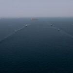 HORMOZGAN, IRAN - FEBRUARY 19: (----EDITORIAL USE ONLY - MANDATORY CREDIT - 'IRANIAN ARMY / HANDOUT' - NO MARKETING NO ADVERTISING CAMPAIGNS - DISTRIBUTED AS A SERVICE TO CLIENTS----) Naval units from Iran and Russia carry out to simulation of rescue a hijacked vessel during the joint naval drills held at the Port of Bandar Abbas near the Strait of Hormuz in Hormozgan, Iran on February 19, 2026. (Photo by Iranian Army/Handout/Anadolu via Getty Images)