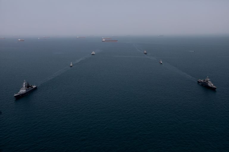 HORMOZGAN, IRAN - FEBRUARY 19: (----EDITORIAL USE ONLY - MANDATORY CREDIT - 'IRANIAN ARMY / HANDOUT' - NO MARKETING NO ADVERTISING CAMPAIGNS - DISTRIBUTED AS A SERVICE TO CLIENTS----) Naval units from Iran and Russia carry out to simulation of rescue a hijacked vessel during the joint naval drills held at the Port of Bandar Abbas near the Strait of Hormuz in Hormozgan, Iran on February 19, 2026. (Photo by Iranian Army/Handout/Anadolu via Getty Images)