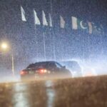A police officer stands guard as the motorcade, believed to be carrying Iranian Foreign Minister Abbas Araghchi, arrives, as Pakistan prepares to host the US and Iran for the second phase of peace talks, in Islamabad, Pakistan, April 25, 2026. REUTERS/Akhtar Soomro