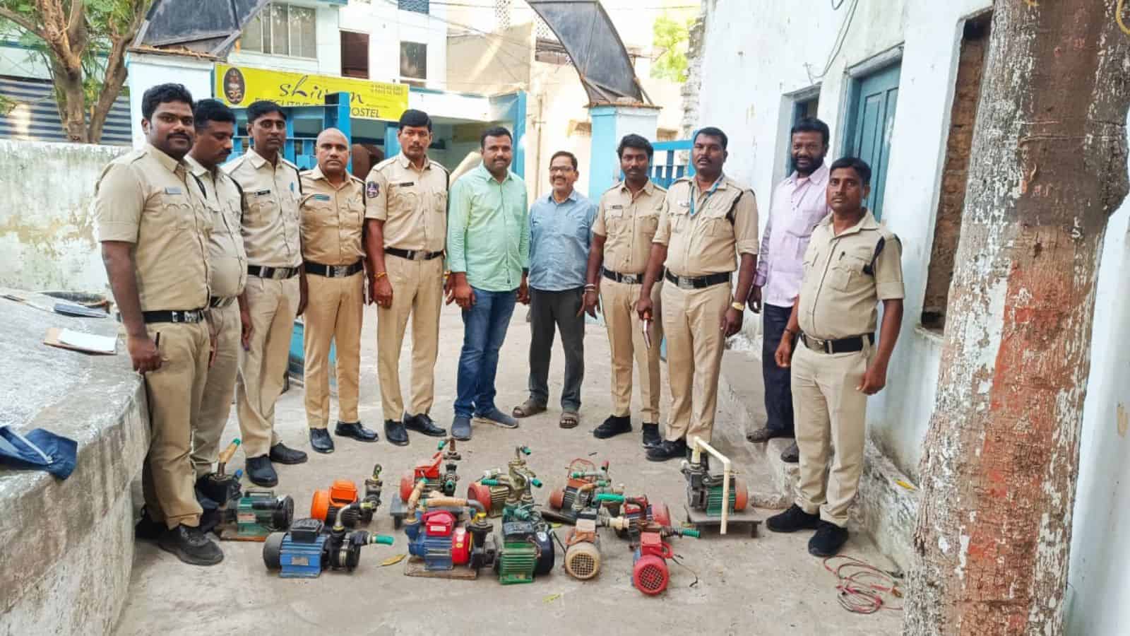 Hyderabad water board officials display 17 seized illegal motors in Secunderabad.
