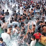 Citizens rush to water parks for relief from heat, as temperatures hit mid-forties