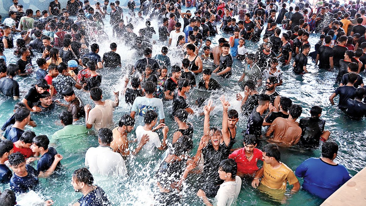Citizens rush to water parks for relief from heat, as temperatures hit mid-forties