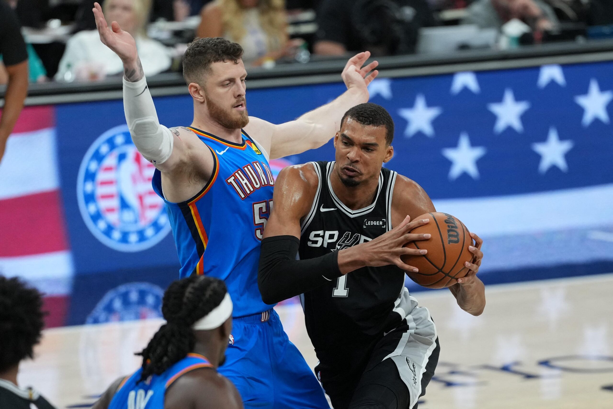 File photo shows Victor Wembanyama (1) dribbling the ball past Isaiah Hartenstein (55) during Game 3 of the Western Conference Finals for the 2026 NBA playoffs. (Daniel Dunn-Imagn Images/REUTERS)
