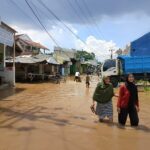 Banjir yang melanda kawasan Ciparay Kabupaten Bandung.