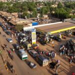 epaselect epa12496759 People line up to fill the tanks of their vehicles at a fuel station in Bamako, Mali, 31 October 2025 (issued on 01 November 2025). Since September, Bamako has faced fuel shortages caused by a blockade on the routes used by fuel tankers in Mali by the Group for the Support of Islam and Muslims (JNIM), an organization affiliated with al-Qaeda. EPA/HADAMA DIAKITE