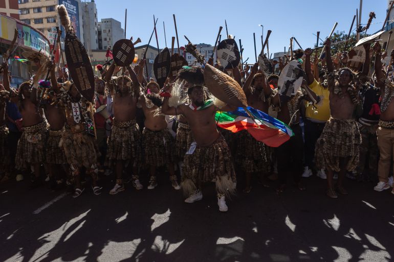 epa12936593 Members of civil society organizations march in Durban, South Africa, 06 May 2026, demanding stricter enforcement of immigration regulations concerning undocumented immigrants and foreign nationals.