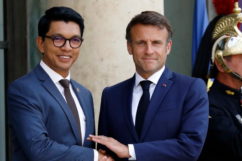Ousted Madagascar President Andry Rajoelina (left) with French President Emmanuel Macron (Getty)