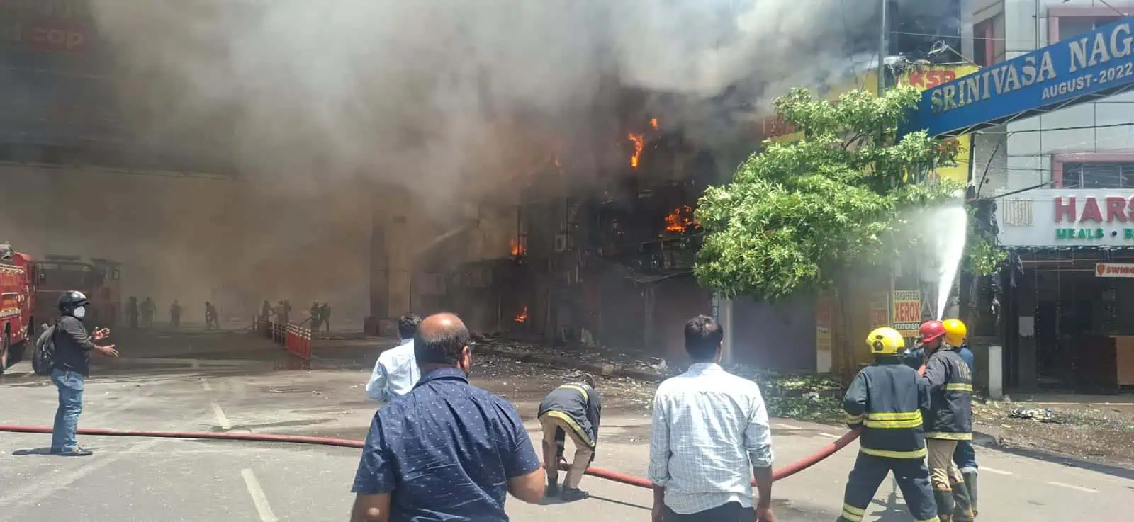 Fire personnel working to douse the blaze