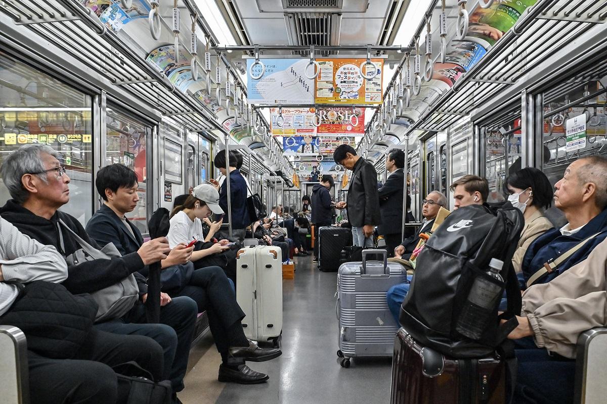People ride on the Tokyo Metro underground system in central Tokyo on October 21, 2024. Richard A. Brooks/ AFP
