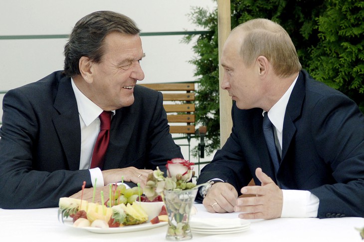 Russian President Vladimir Putin meets with former German Chancellor Gerhard Schroeder in 2005.